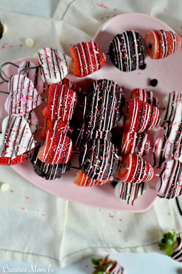 Marshmallow, strawberry and brownie drizzled with chocolate and sprinkles.