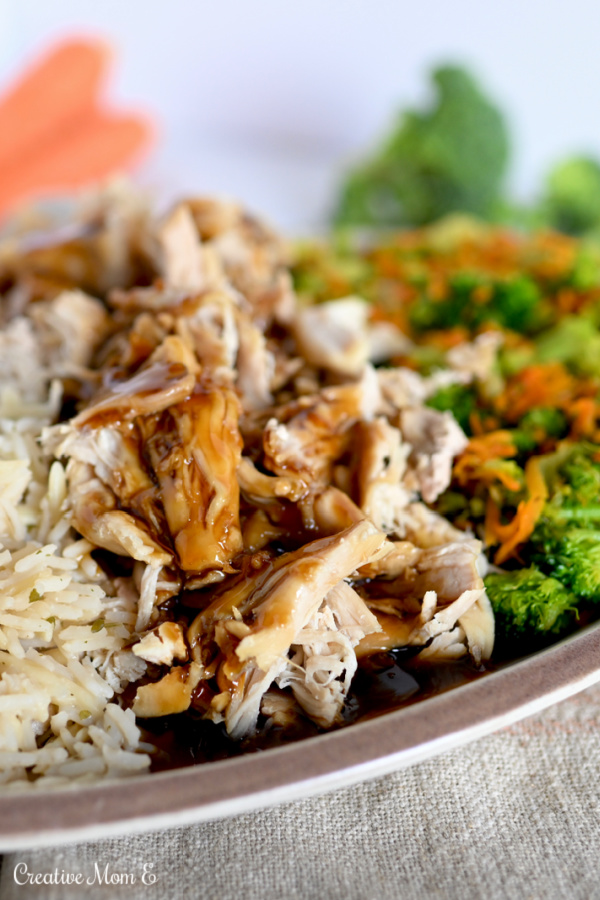 Chicken Teriyaki with broccoli, carrots and rice.